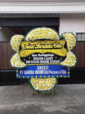 Papan Bunga Duka di Pelabuhan